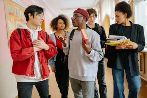 Youth talking in hallway
